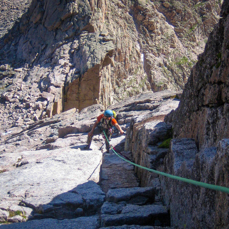 A climber ascending the North Face of Longs Peak in Rocky Mountain National Park under the guidance of one of our guides.