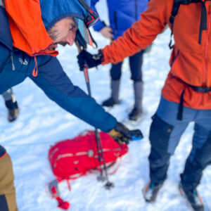 Participants practicing beacon search in AIARE Level 1 avalanche safety course.