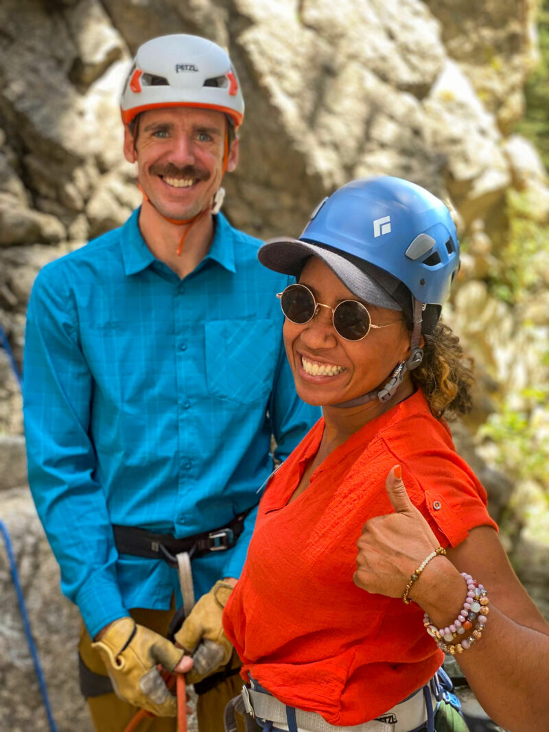 Rock Guide demonstrating belay techniques to beginners.